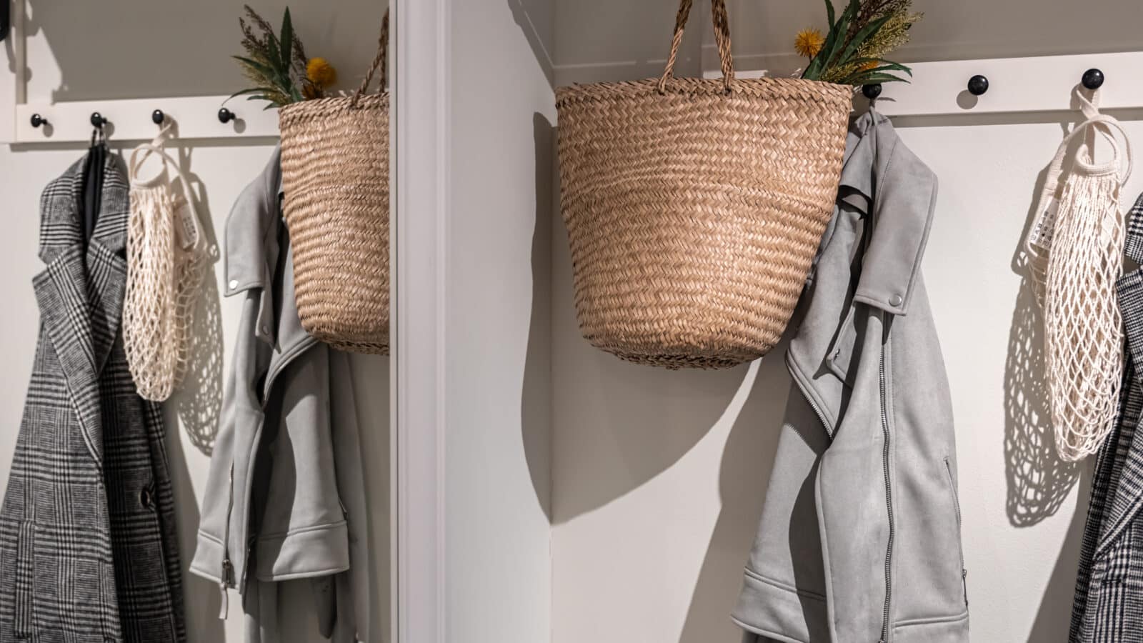 Entryway closet with hooks for hanging coats and jackets by the front door