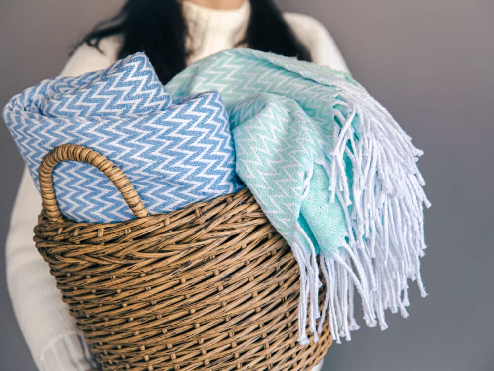 Blanket Storage Ideas for a Pile That Doubles Every Winter