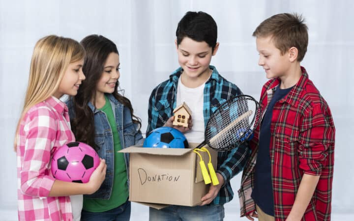 Decluttering With Kids: How to Get Rid of Toys and Clothes Without a Meltdown