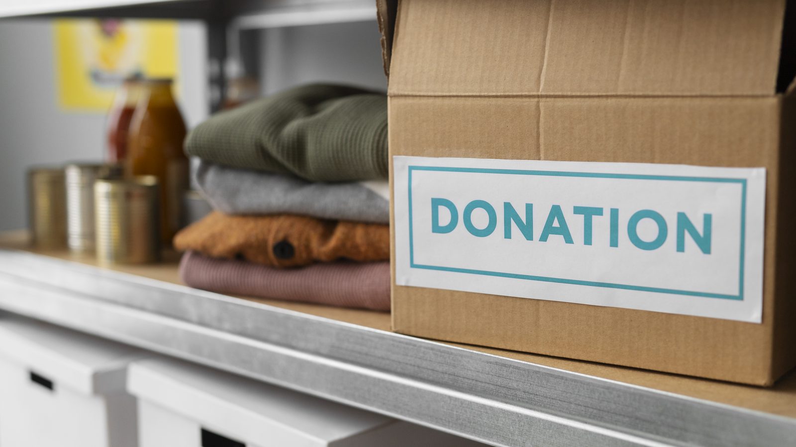 Boxes of clothes and food items collected for charity donation